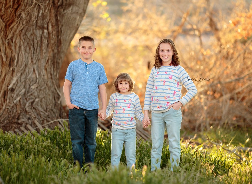 Pose with 3 kids
