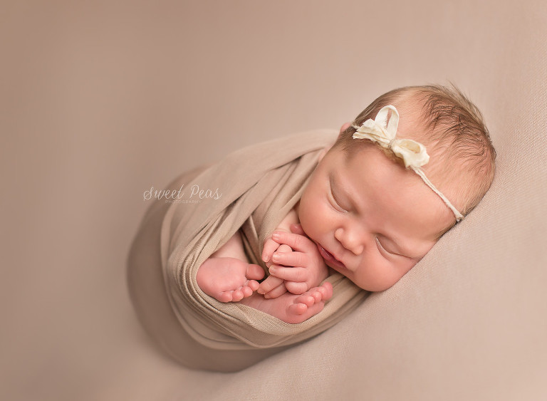 Kingman Arizona Newborn Photography baby girl wrapped in a brown wrap
