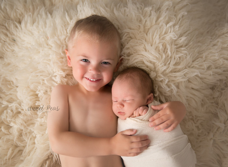 Kingman Newborn Photographer sibling pose