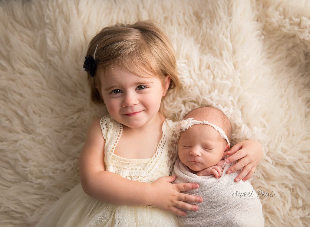 Kingman Arizona Newborn Photographer newborn sibling pose