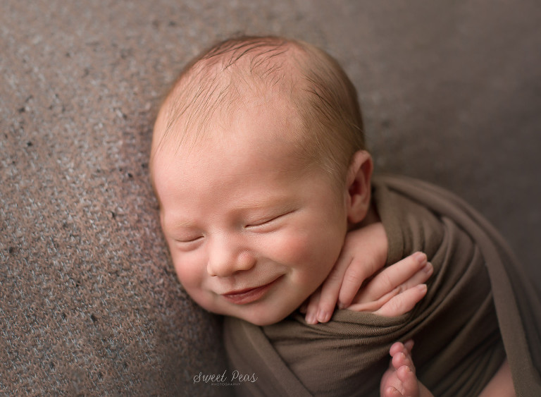 Kingman Newborn Photographer newborn smiling