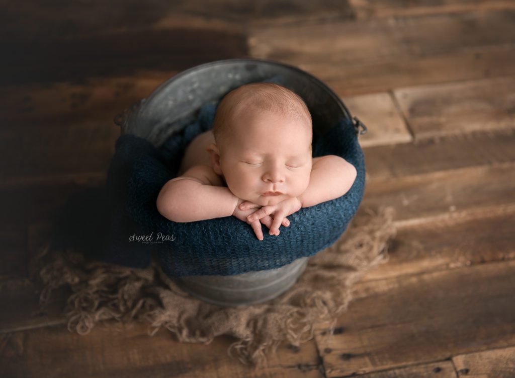 Kingman Newborn Photographer baby in a bucket