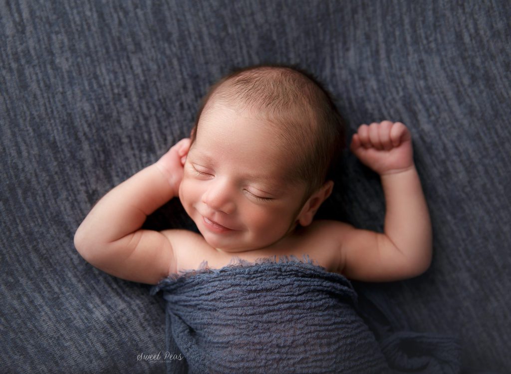 baby smiles newborn